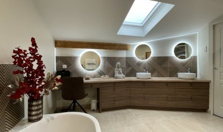 Rénovation complète d'une salle de bains dans une maison à Béligneux.