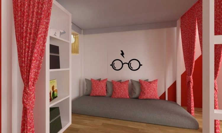Aménagement et décoration d'une chambre d'enfant avec coin lecture sur le thème Harry Potter dans un appartement à Lyon.